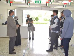 GR-12-Boys giving donation at Sharjah City for HumanitarianServices
